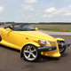Illustration for article titled Heres How A Bright Yellow Plymouth Prowler Laps A Track